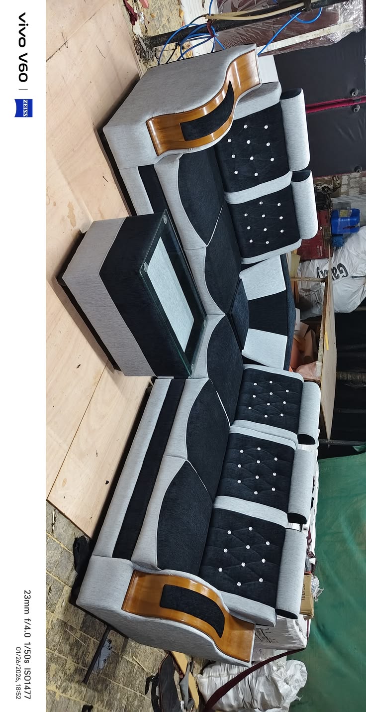 Modern L-Shaped Sectional Sofa with Tufted Back and Wooden Accents
