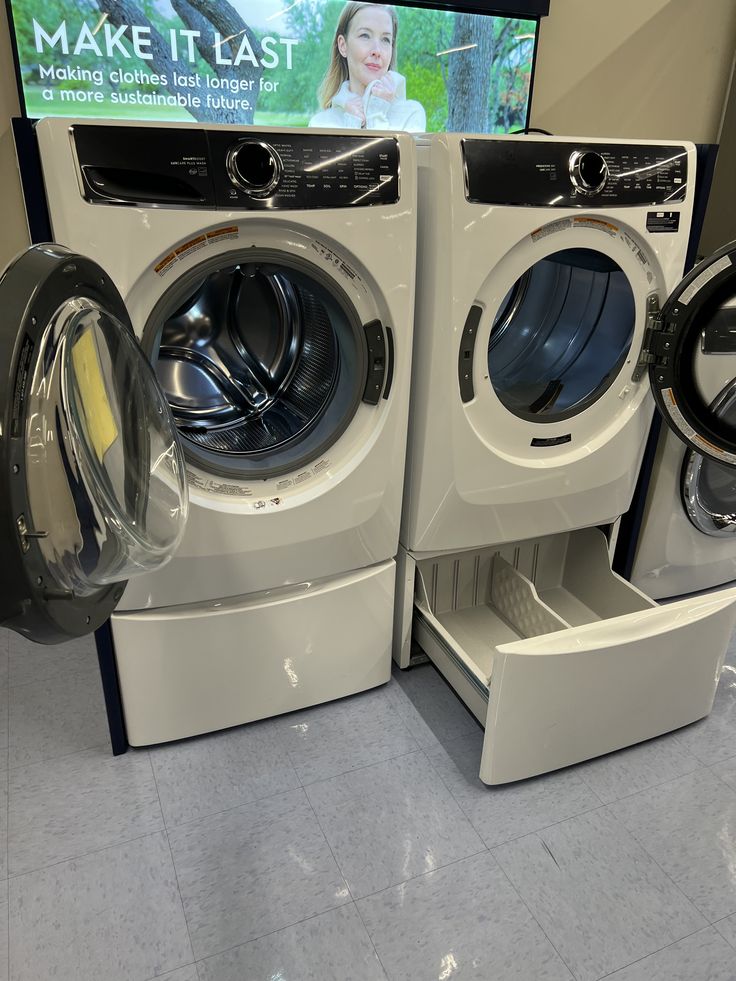 LG Front Load Washer and Electric Dryer Set with Pedestals